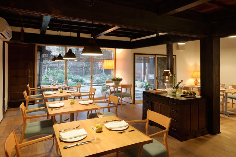 Dining room of a modern Japanese restaurant inside a traditional house