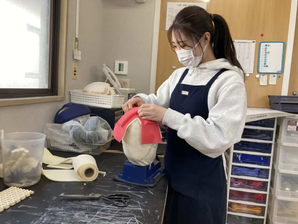 Japanese woman makes headgear for  children with cerebral palsy