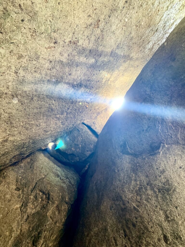 sunlight piercing a crevice in the rock