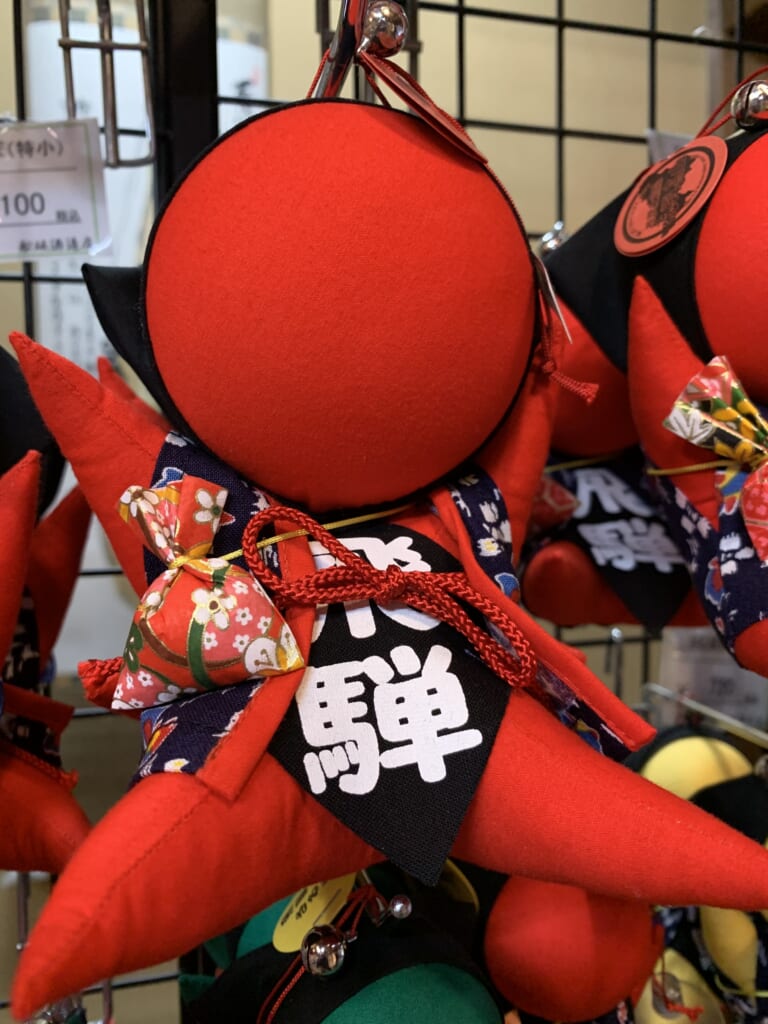 traditional JApanese red sarubobo doll