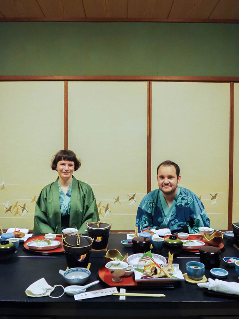 two people in kimono at kaiseki dinner in Japanese ryokan inn