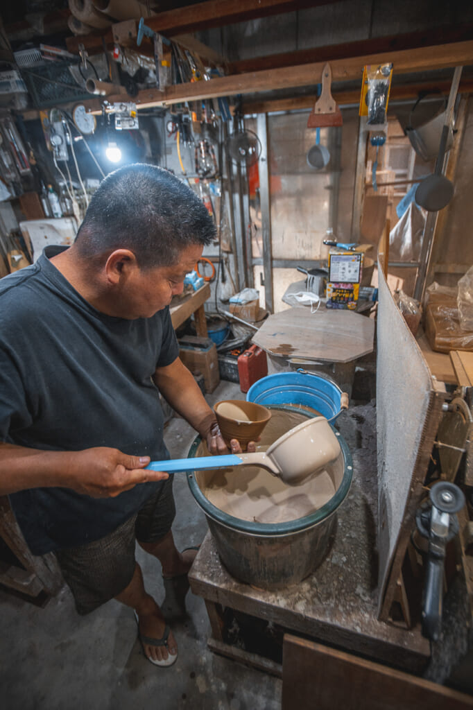 Nakama's brother working in the workshop  in Okinawa, Japan