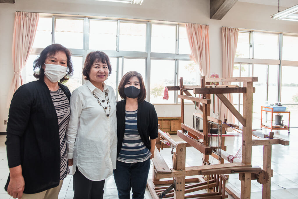 women working in Yuntanza Hanaori, a traditional Japanese fabric