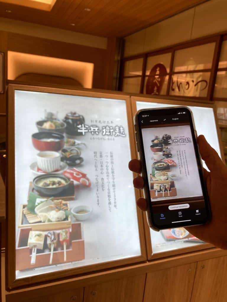 smartphone translating Japanese text with the google translation app