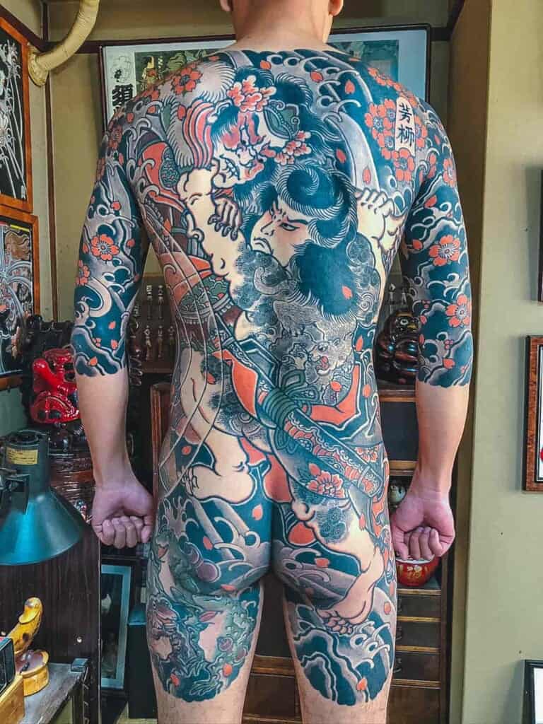 Japanese man with full back tattoo