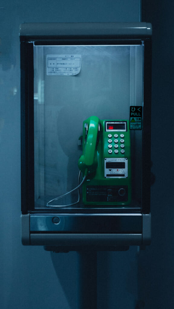 A telephone box, where you usually start a phone call as moshi moshi