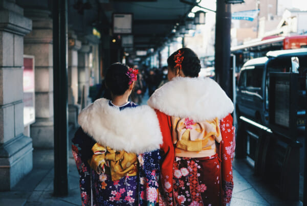 Two girls dressing the Seijin Shiki kimono in Japan