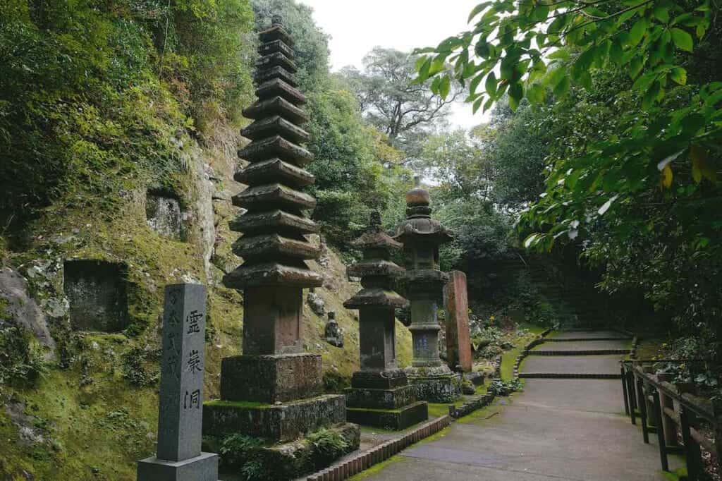 Stone statues along the path leading to Reigando in Japan