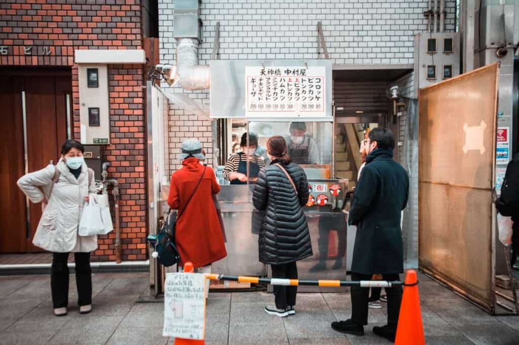 croquettes shop at tenjinbashisushi shopping street in osaka