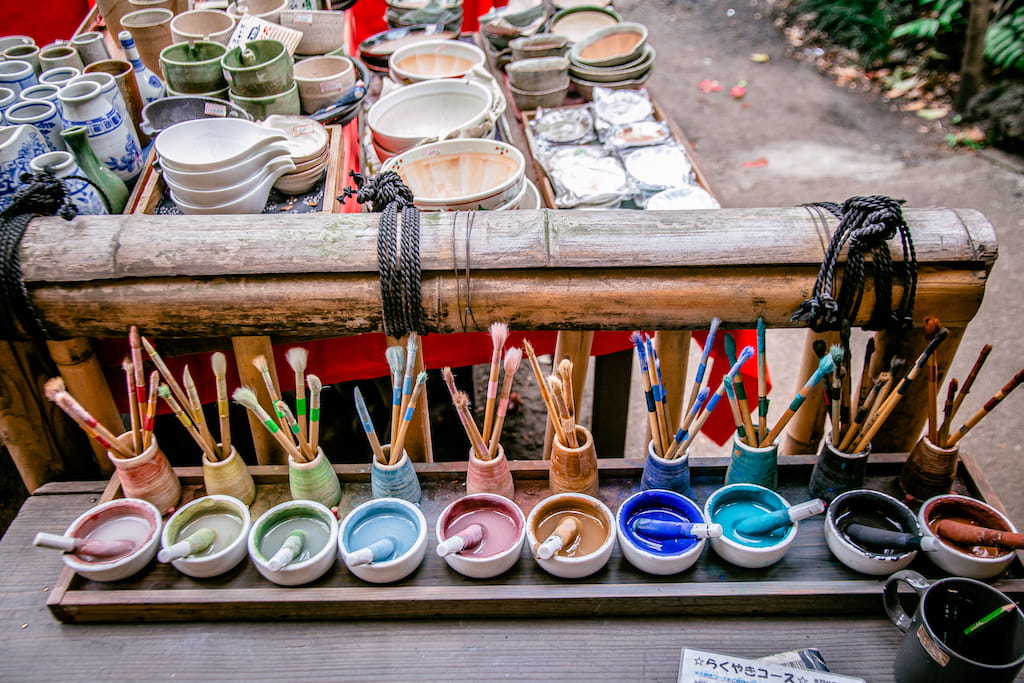 paints and brushes in jindaiji's pottery workshop 