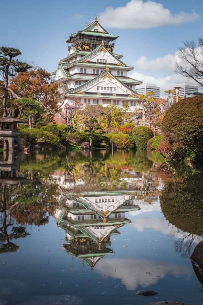 osaka castle and its reflection in the water