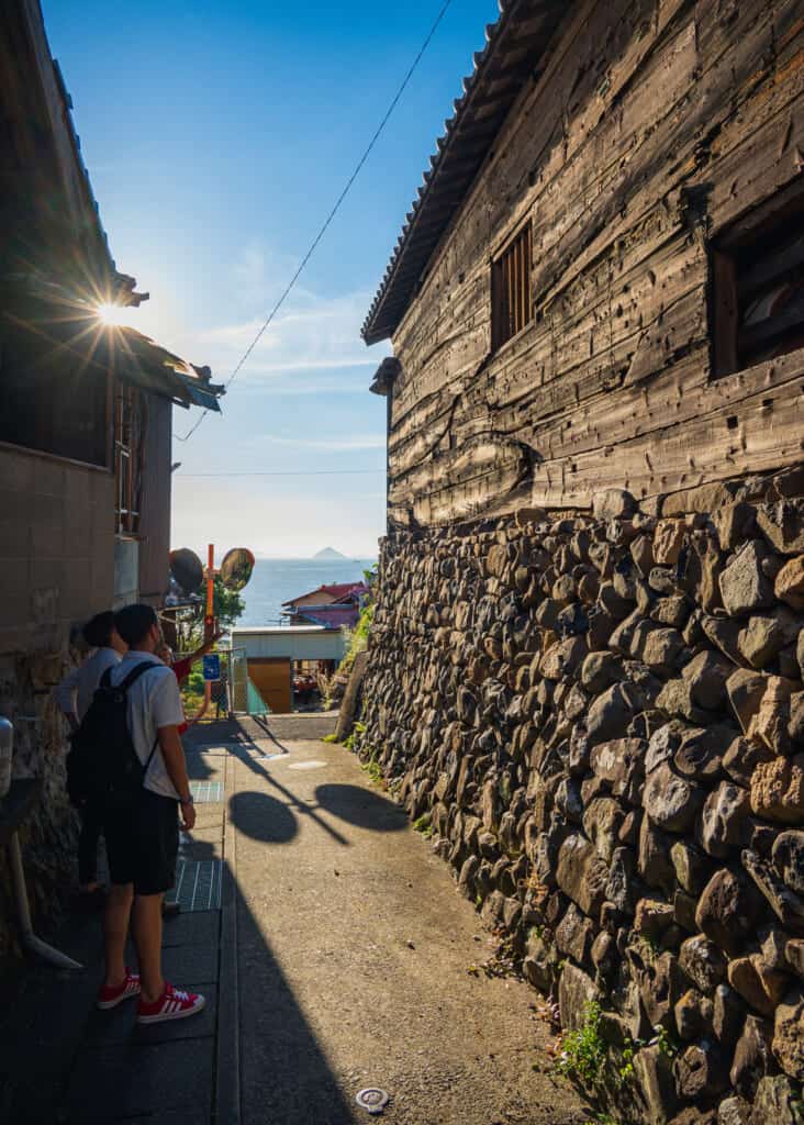 Ogijima Village street with stone wall in Japan