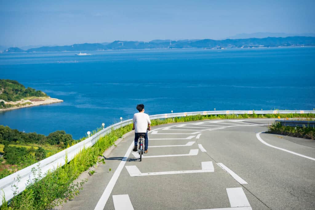cycling along seto inland sea in shikoku, japan