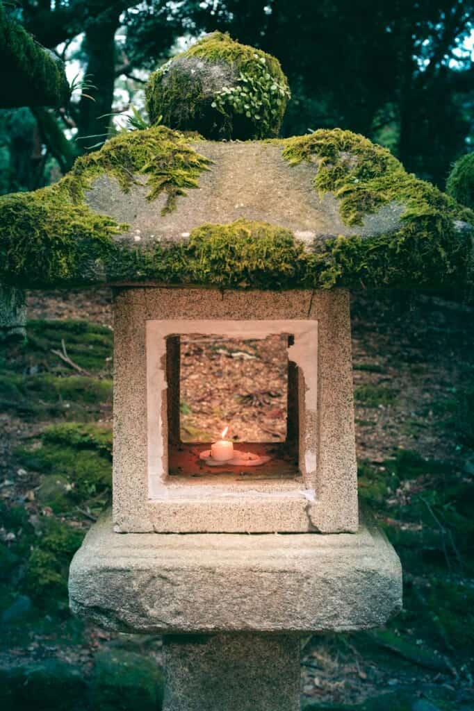 a traditional japanese lantern lit with a candle in Japan