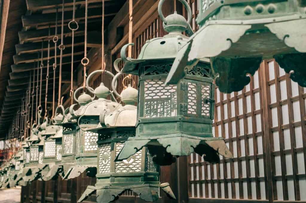 traditional lanterns in a shinto shrine in Japan