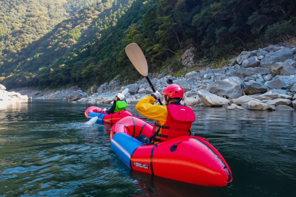 people trying rafting in shikoku,  japan