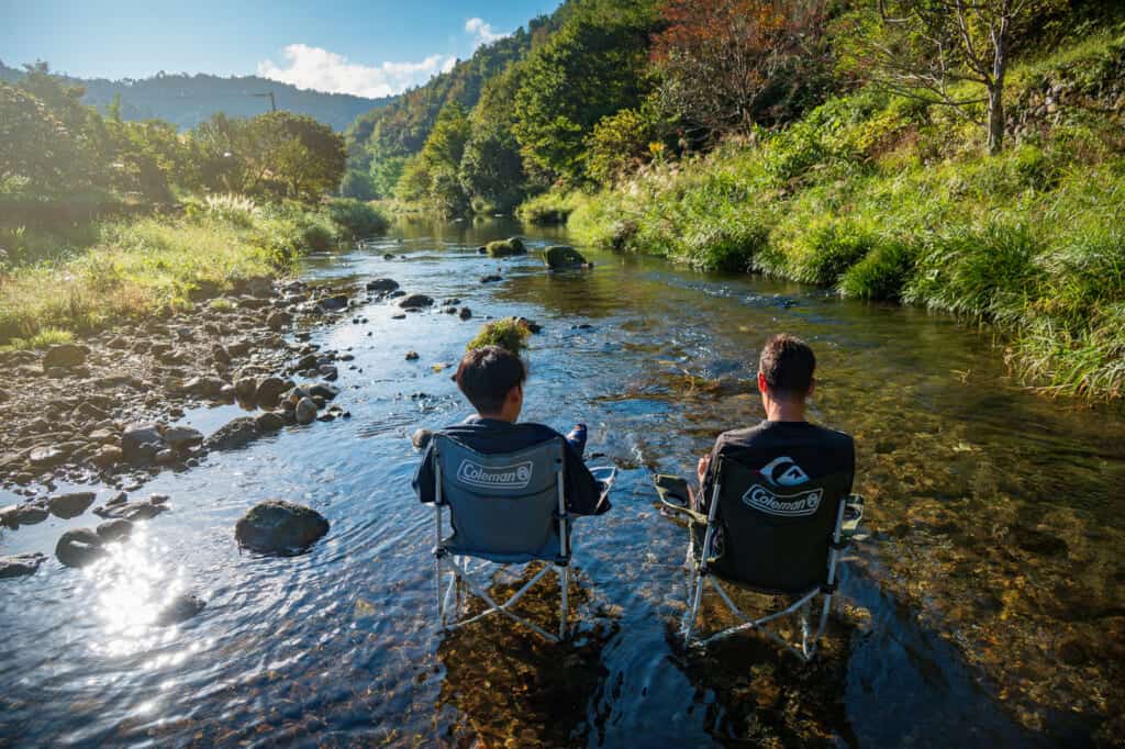 two men chairing in the shimanto river, shikoku