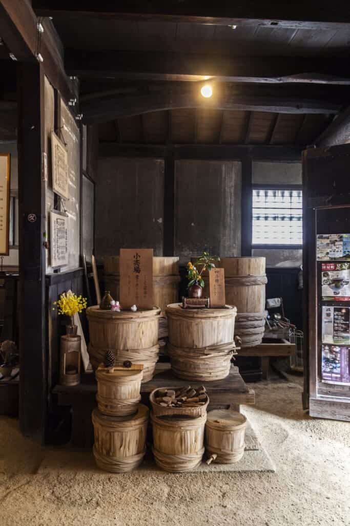 Antique soy sauce barrels at Old Merchant Residence of Fujita Senneji, Ashimori, Japan
