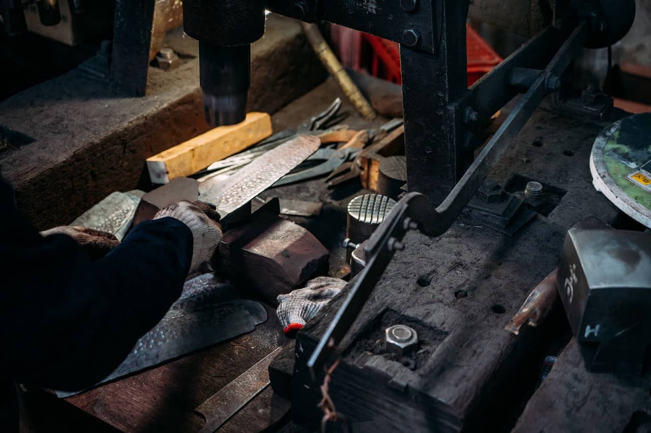 craftsman making knife blade at takefu knife village in fukui