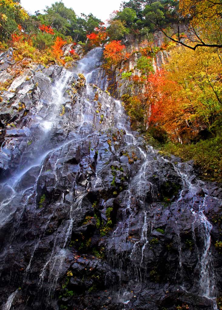 waterfall in autumn in japan goshikigahara forest