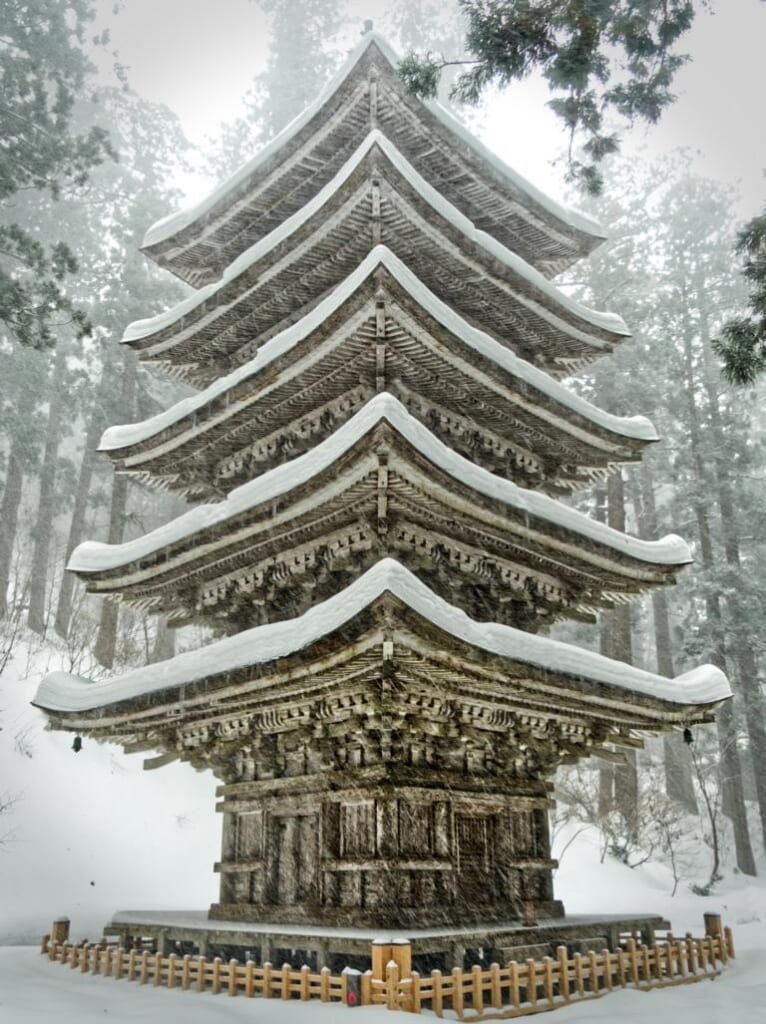 Japanese Hagurosan pagoda covered in snow in Japan
