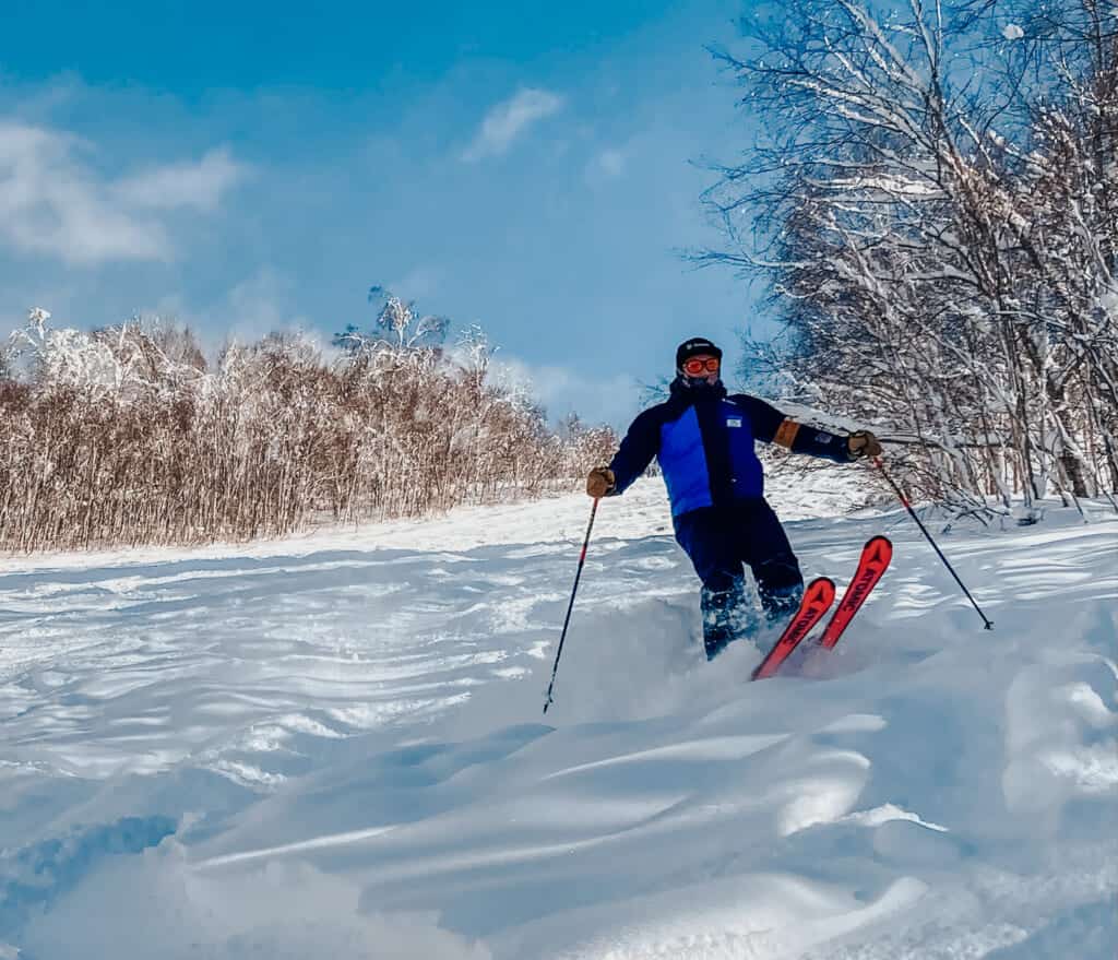 Skier on powder snow at Kamui ski links
