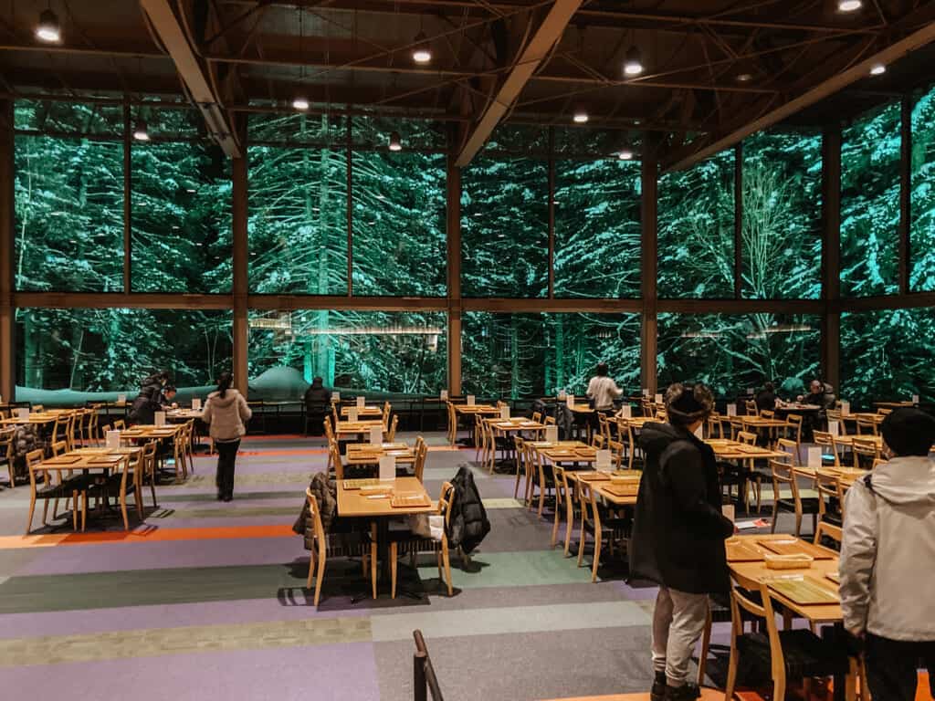 Dining area of large panoramic floor to ceiling view of Hoshino Resort Tomamu