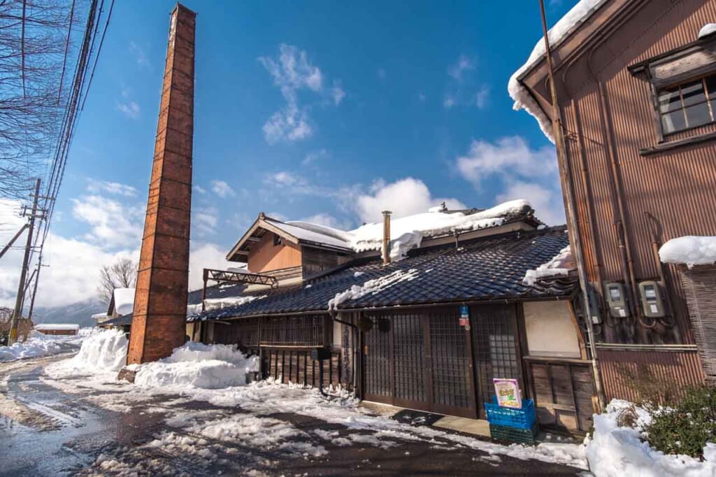 sake brewery chimney during winter in Japan