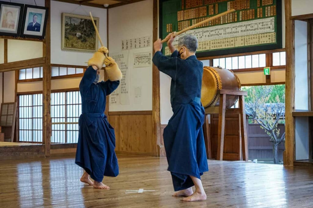 two people practicing martial  arts  in japan