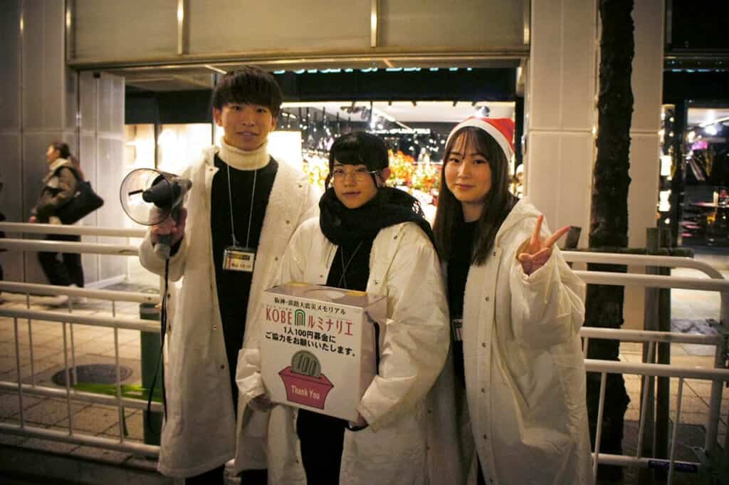 young Japanese people holding a donation box