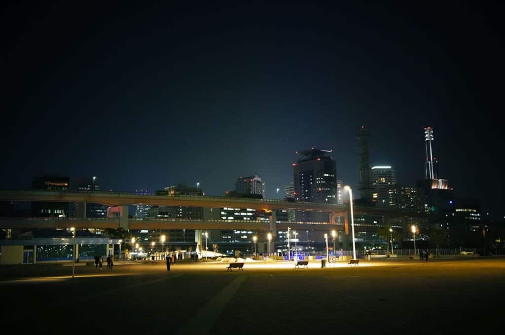 futuristic-looking night view of urban Meriken Park