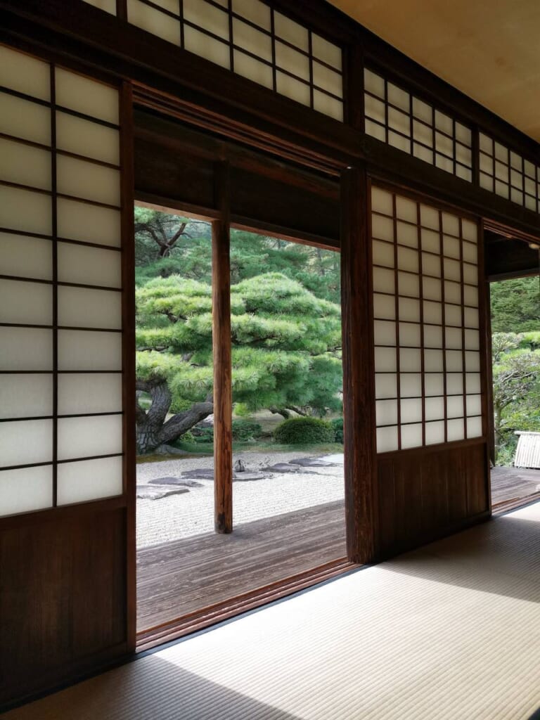 View of Ritsurin Garden through the sliding doors of Kikugetsutei tea house in Takamatsu.