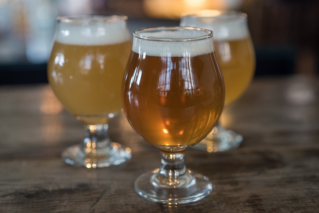 Three glasses of Japanese craft beer.