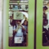 photographer reflected on Japanese train door