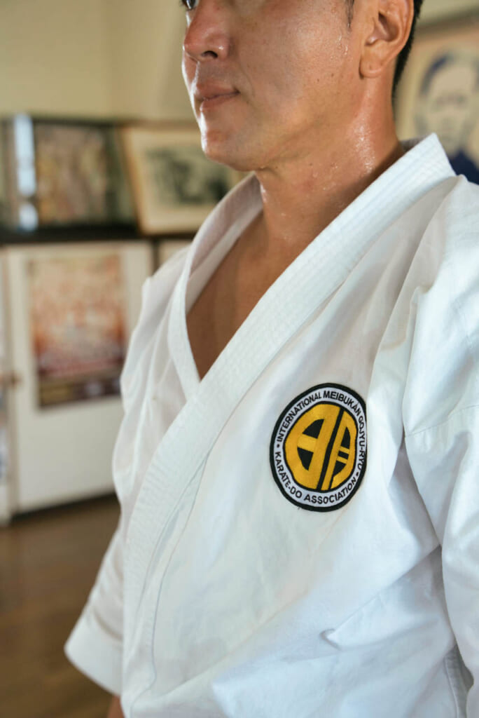 close up of man's karate gi chest with Meibukan insignia