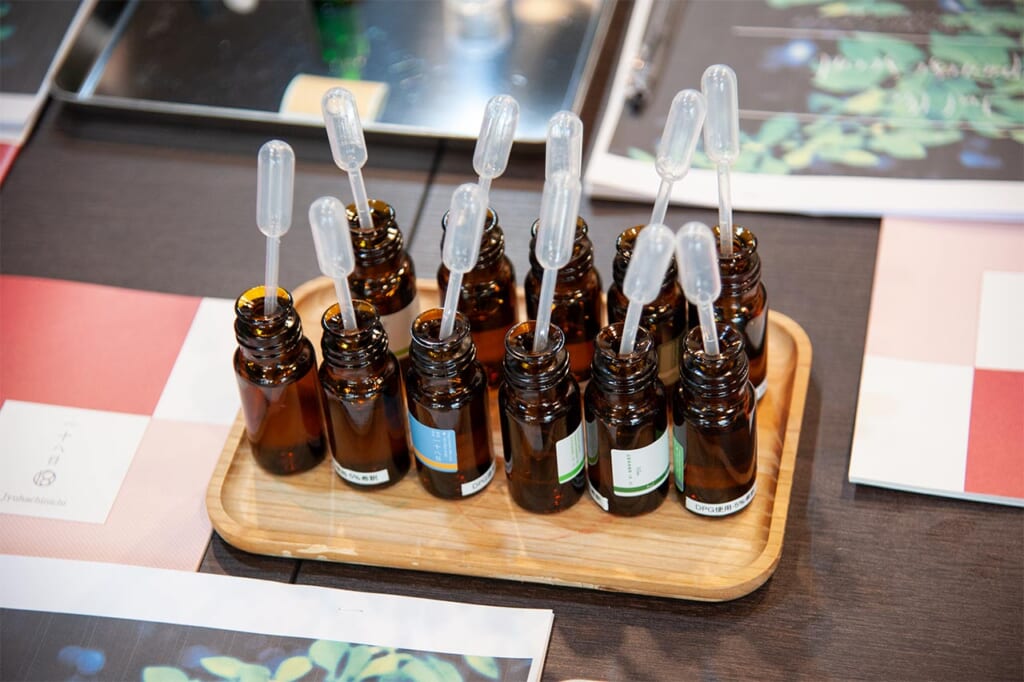 Pipettes in bottles of essential oil at Jyuhachinichi's store in Tajima 