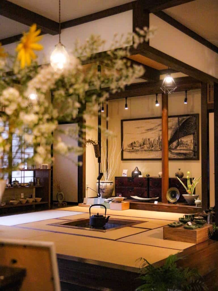 Living room of Jugatsu shop with tatami floors and wooden chests