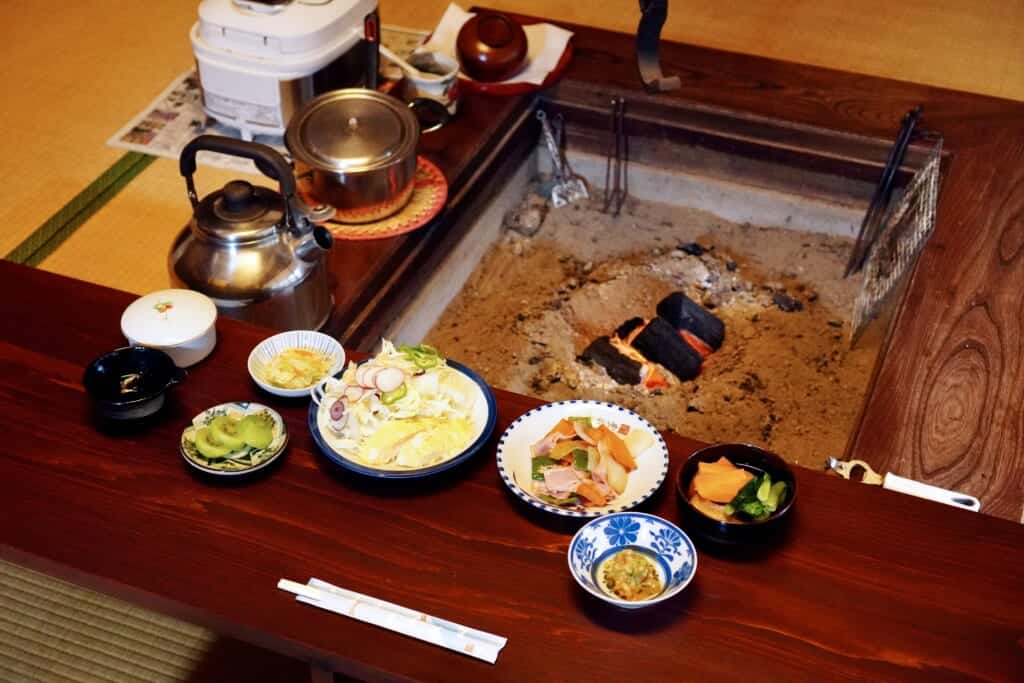 A Japanese breakfast at a local lodging around a traditional wood fire