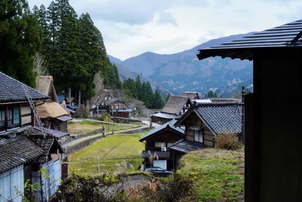 A view of the thatched roof houses in Gokayama from behind one of the homes