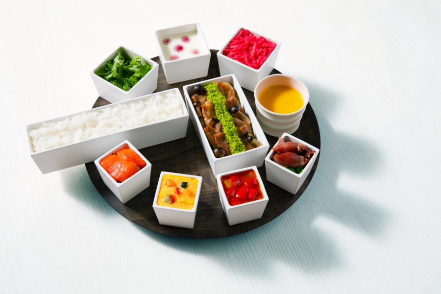 Contemporary Japanese meal with 10 small dishes decorated on a traditional Japanese plate at BiBiBi & JURULi