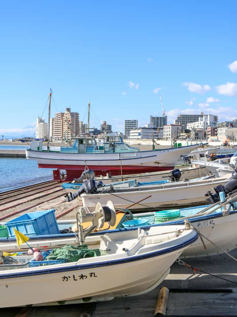 Fishing boats in Japan docked on a beach