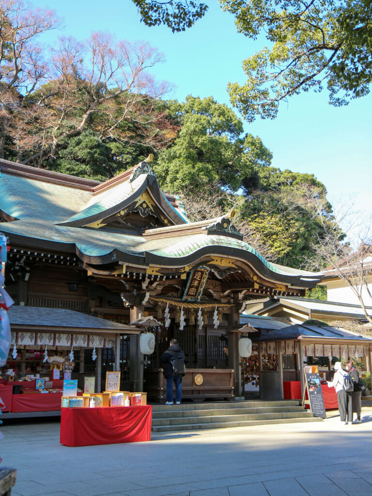 person praying at Enoshima shrine