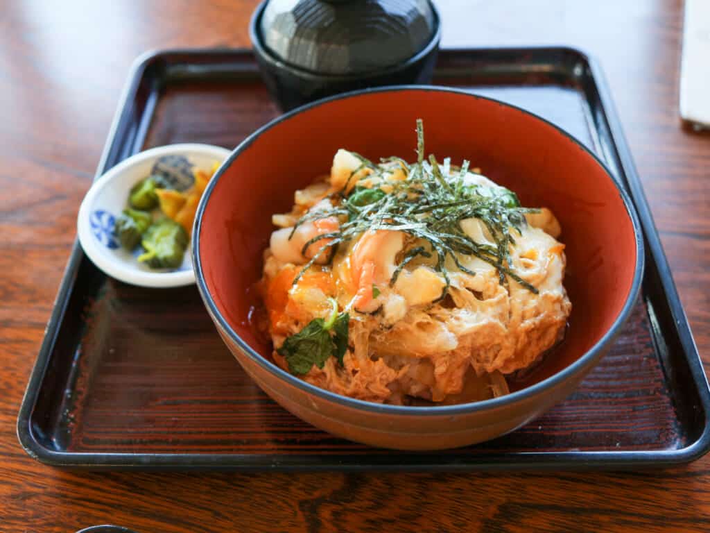 chicken and egg donburi over rice in Japanese restaurant