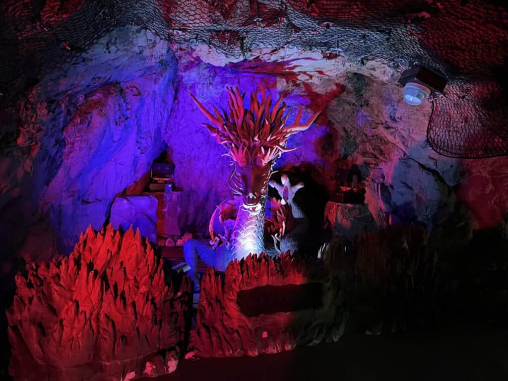 illuminated dragon sculpture in Iwaya Caves