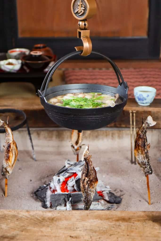 traditional Akita style hot pot and fish grilled over charcoal