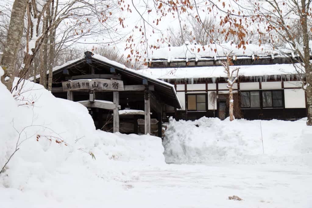 Outside of the onsen resort building in the snow  in Semboku, Akita, Japan