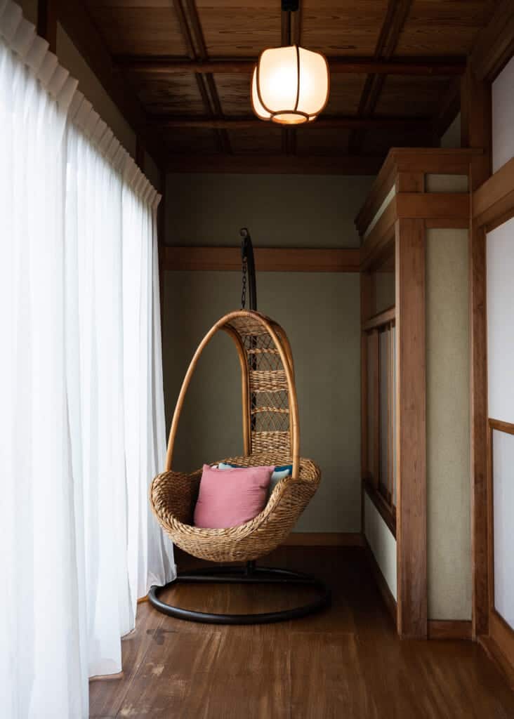 basket chair at the end of a japanese hallway in japan