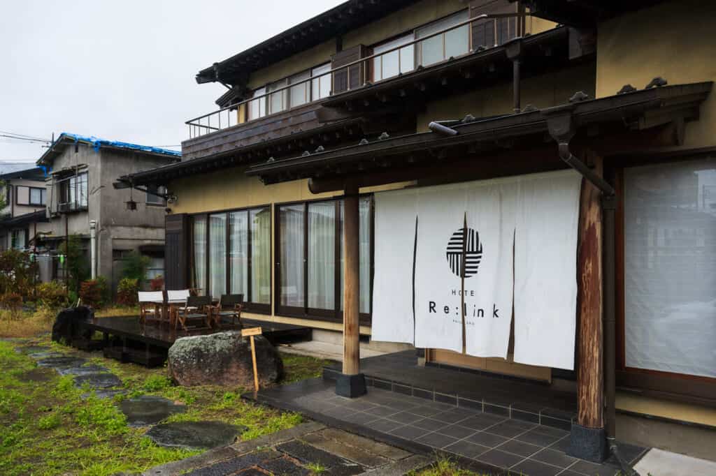 re:link hotel exterior in japan, a sustainable tourism example