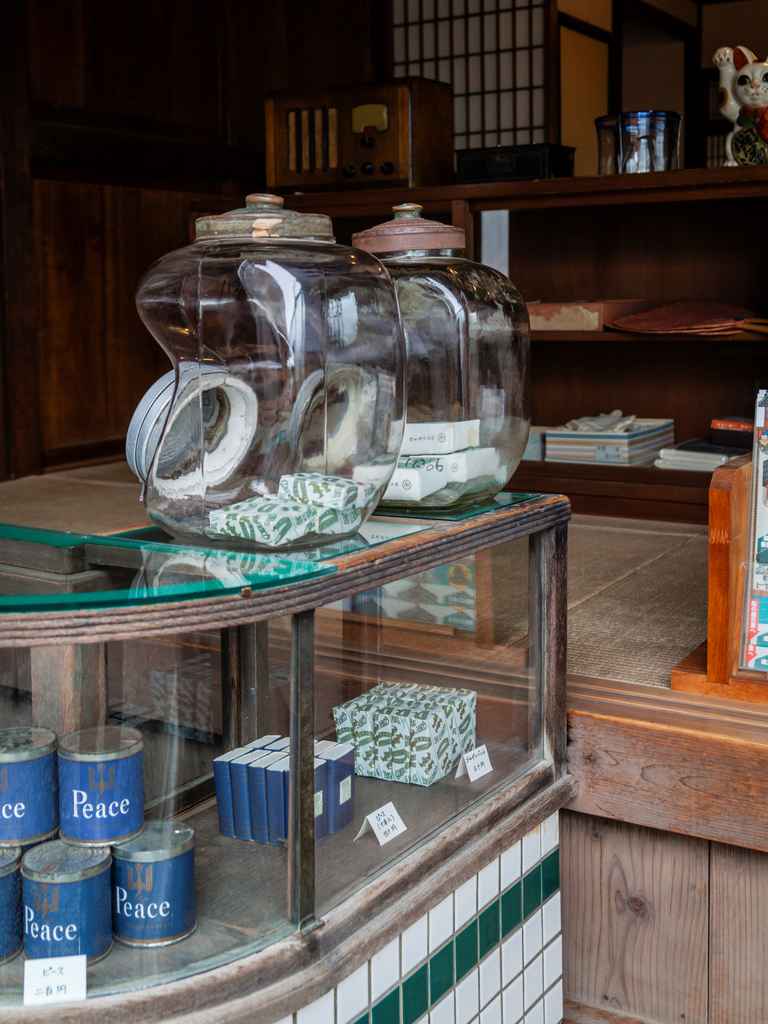 jars of fishing material in an open air fishing village museum in japan