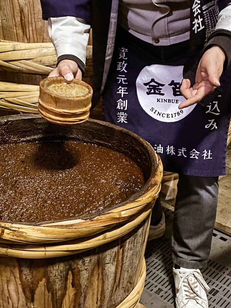 fermented soy sauce in wood vat in Japan